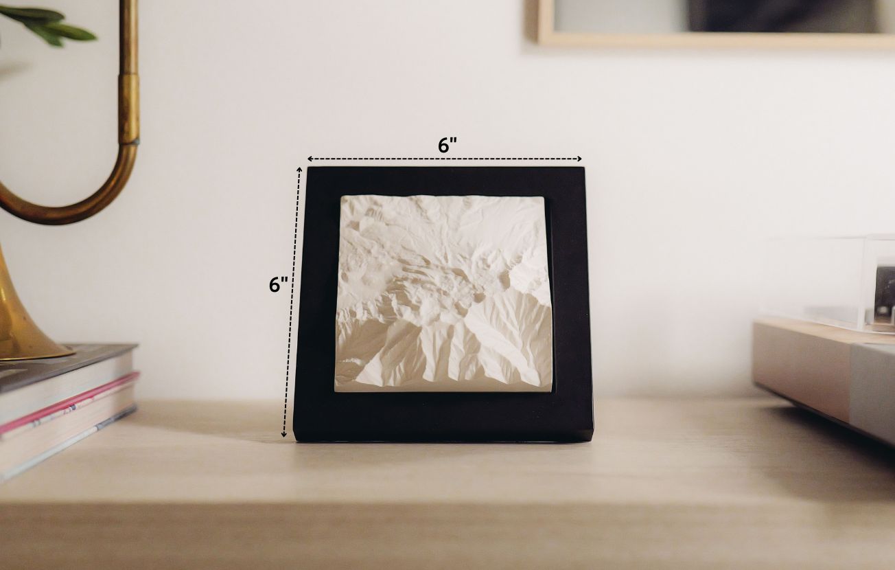 Mountain model with the description 6" x 6" on it.