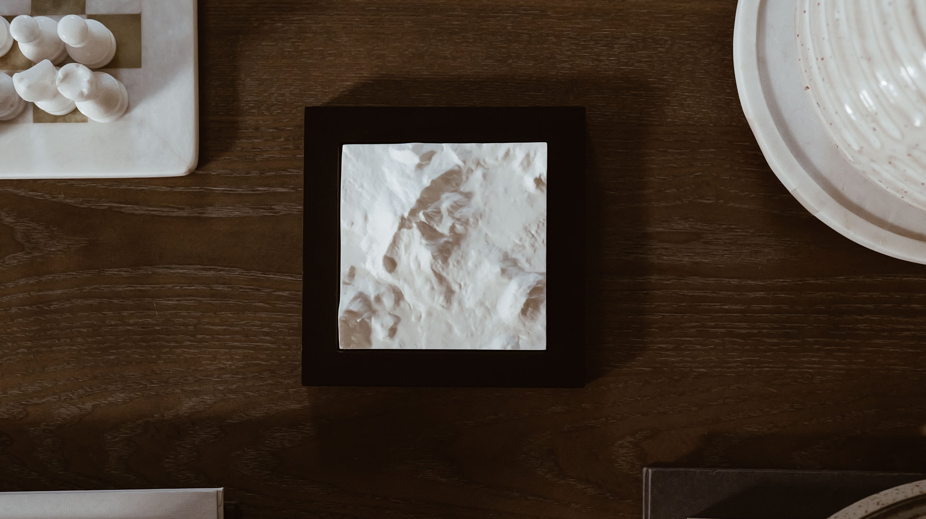 Mountain model sitting on a table. 