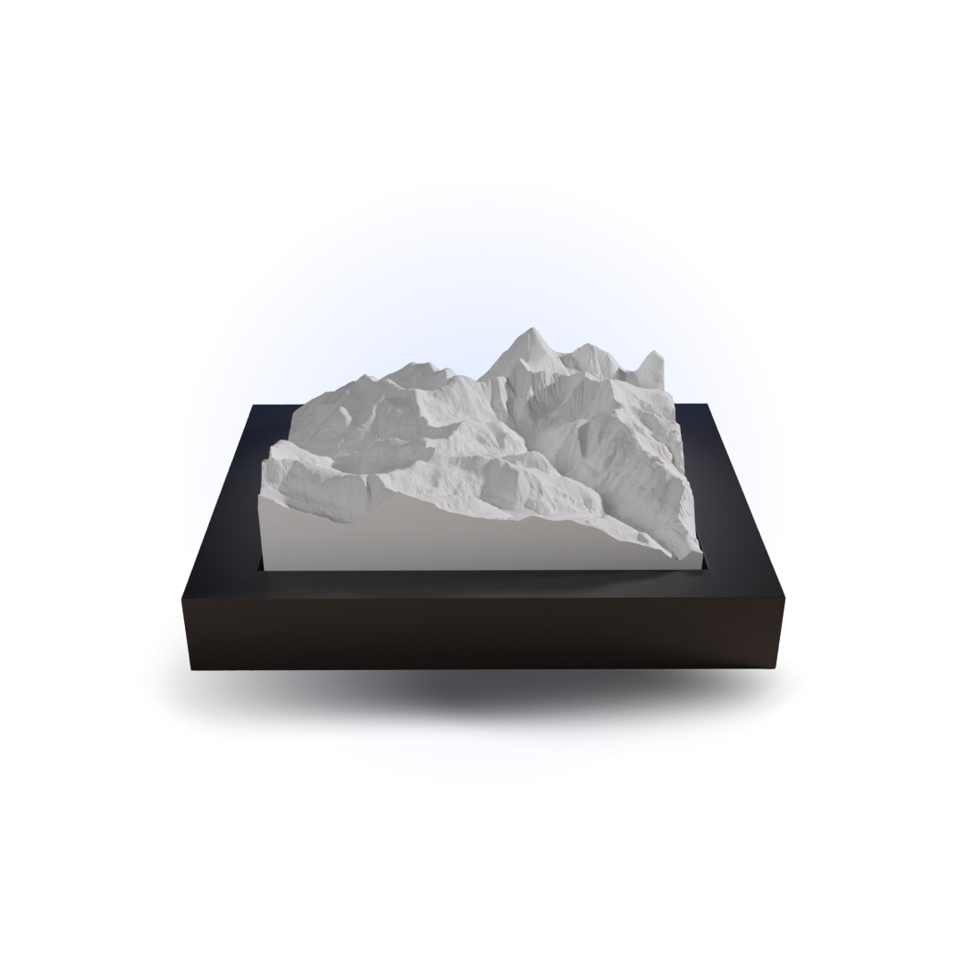 3D mountain model on a black base with a white background