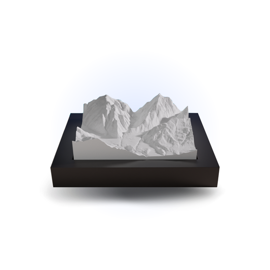 Model of a mountain range on a black base with a white background