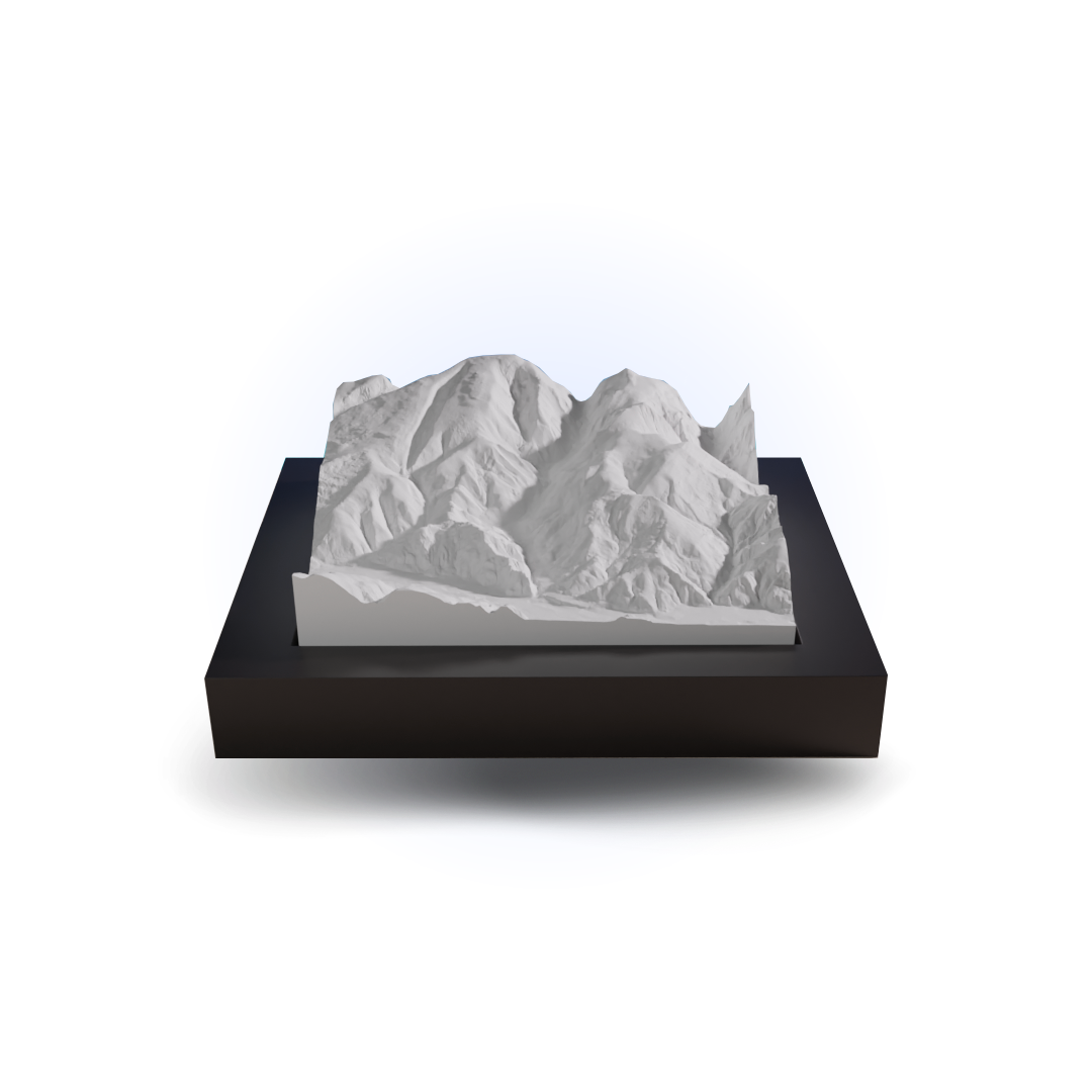 3D mountain model on a black base with a white background