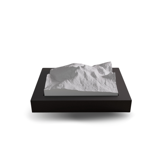 Black rectangular container with a textured white interior on a white background