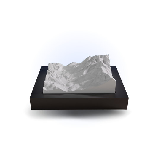 3D mountain model on a black base with a white background