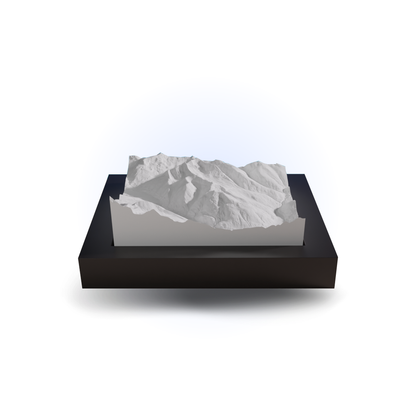 3D mountain model on a black base with a white background