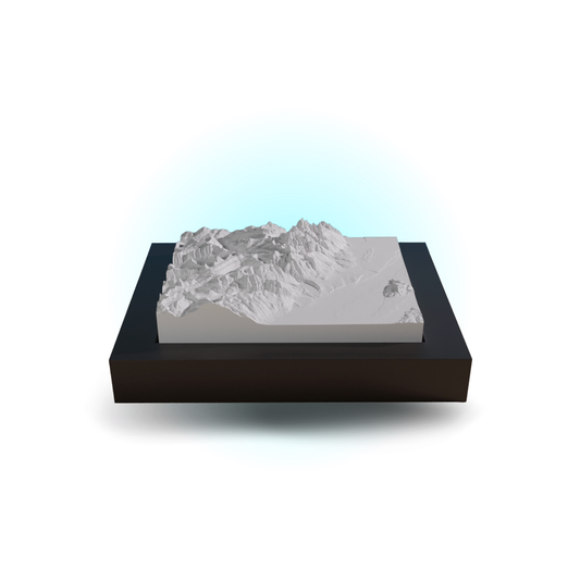 3D mountain model on a black base with a white background