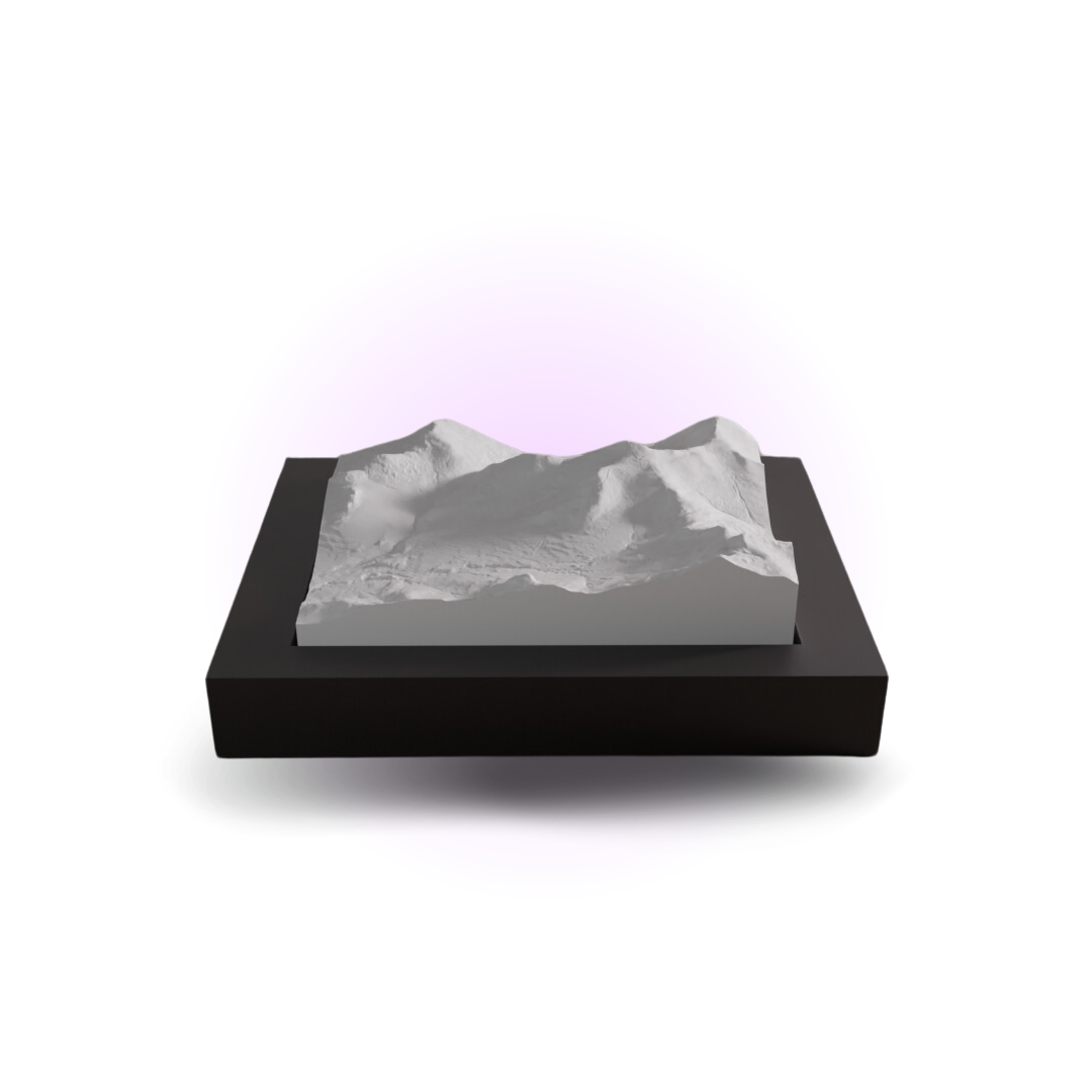 3D mountain model on a black base with a white background