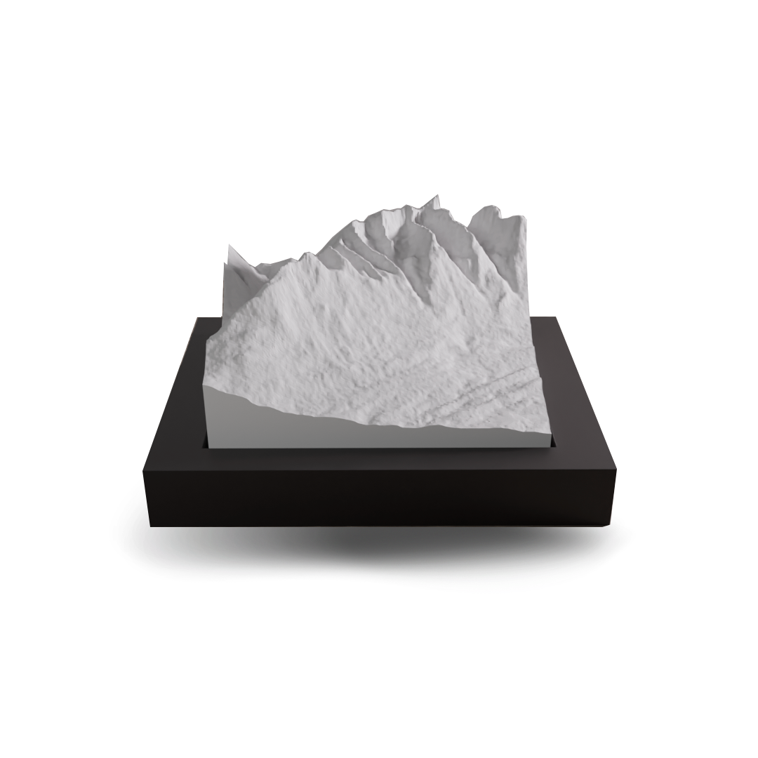3D mountain model on a black base with a white background