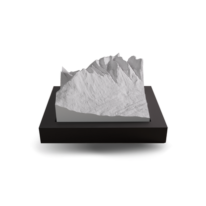 3D mountain model on a black base with a white background