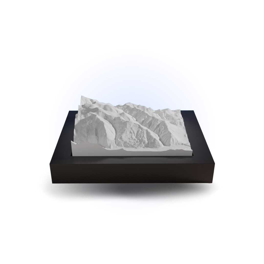 3D mountain model on a black base with a white background