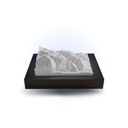 3D mountain model on a black base with a white background