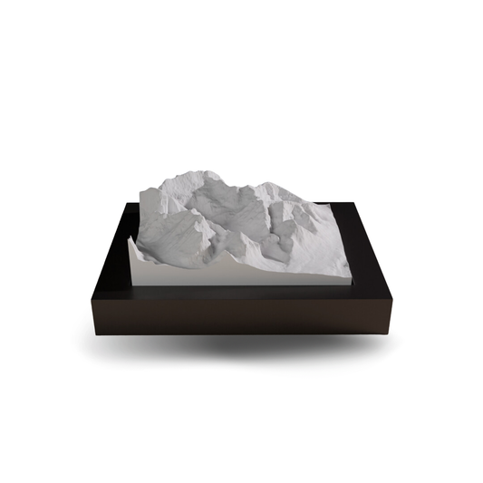 3D mountain model on a black base with a white background