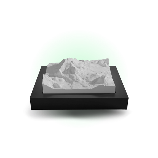 3D mountain model on a black base with a white background