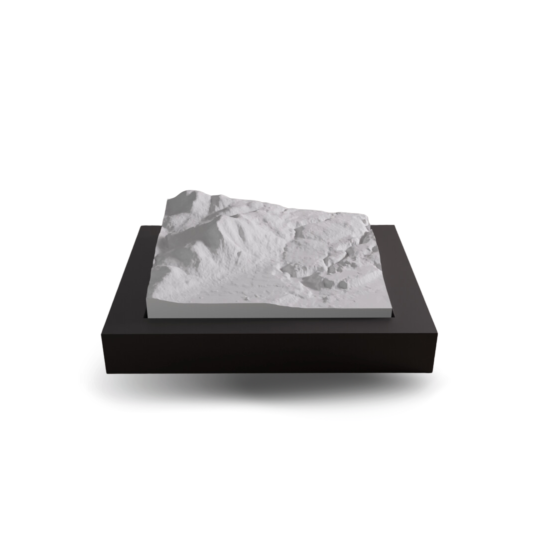 Marble-like material on a black base with a white background