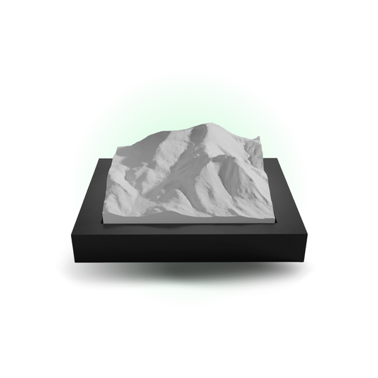 3D mountain model on a black base with a white background
