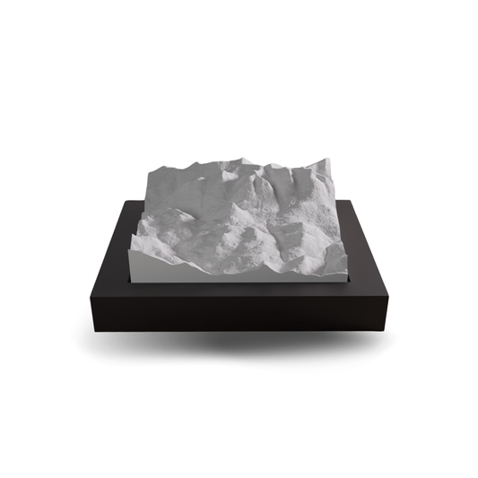Geographic model on a black base with a white background