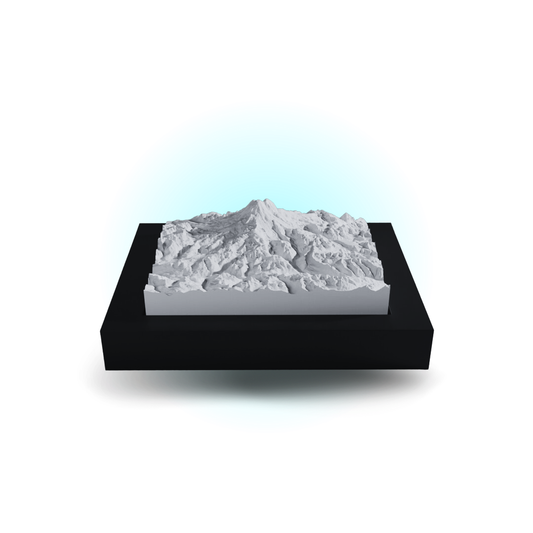 3D mountain model on a black base with a white background