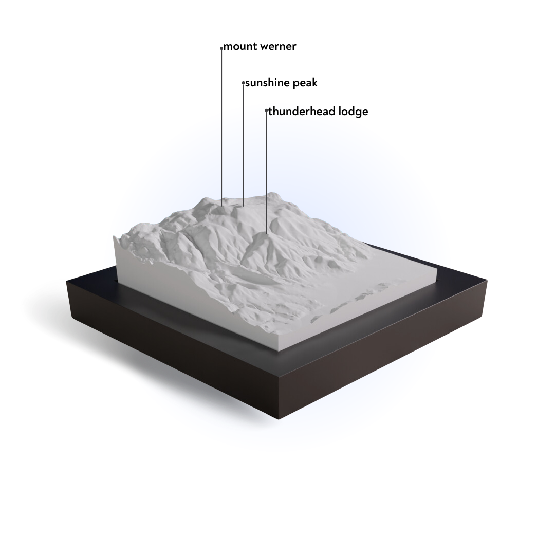 3D model of a mountain with labeled peaks on a white background