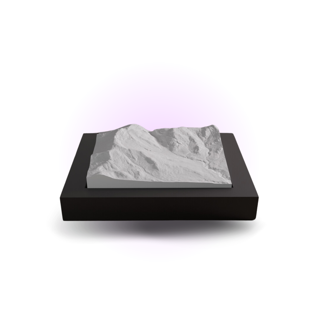 3D mountain model on a black base with a white background