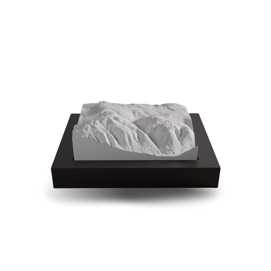 3D landscape model on a black base with a white background