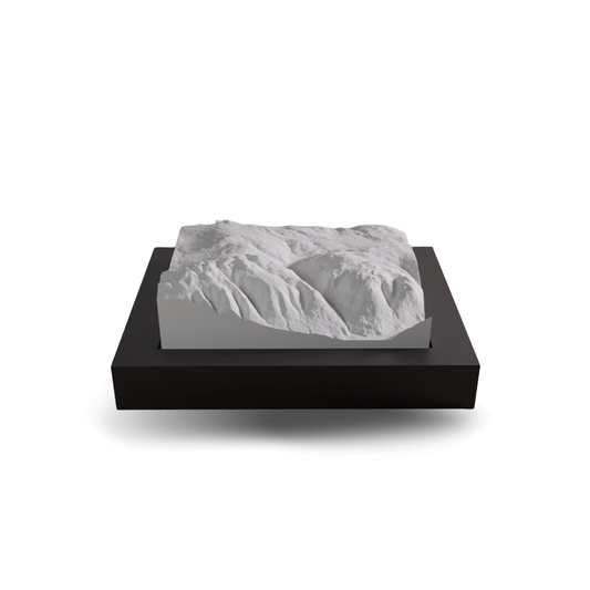 3D landscape model on a black base with a white background