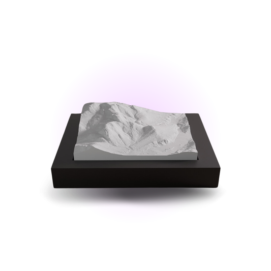 Marble-patterned soap on a black base with a white background