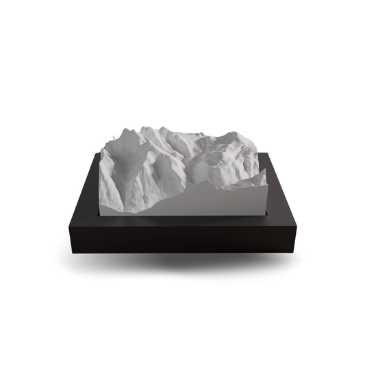 3D mountain model on a black base with a white background