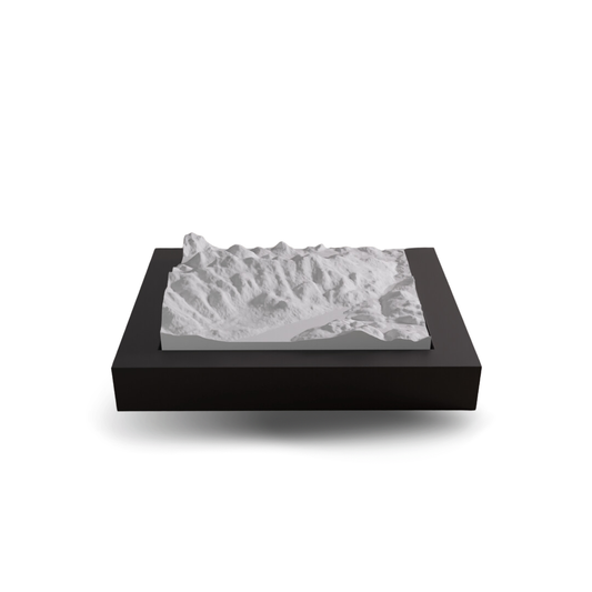 Topographic model on a black base with a white background